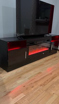 TV stand with fireplace, LED lights, and heating , like New.