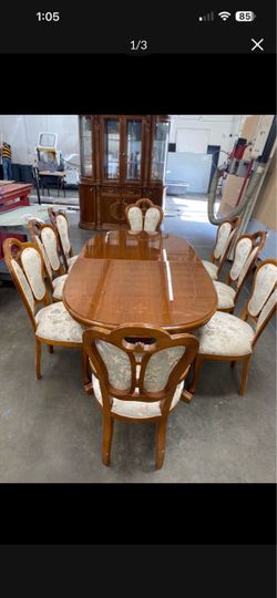 Beautiful dining table with 8 chairs and  china cabinet