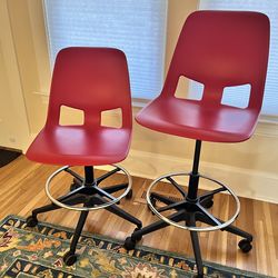 Red adjustable office or table chairs