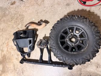 Rzr exhaust and tire mount