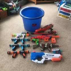 5 Dart Guns, 4 Power Poppers Guns, 1 Water Gun, 1 Toy Camo1 Sword & Storage Tote