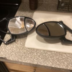 Truck side mirrors, two different lenses on the mirrors