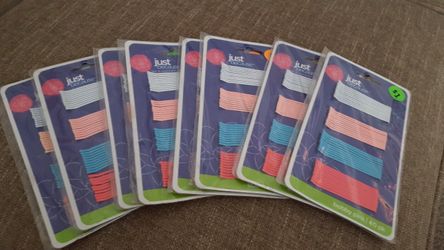 Colored bobby pins, each