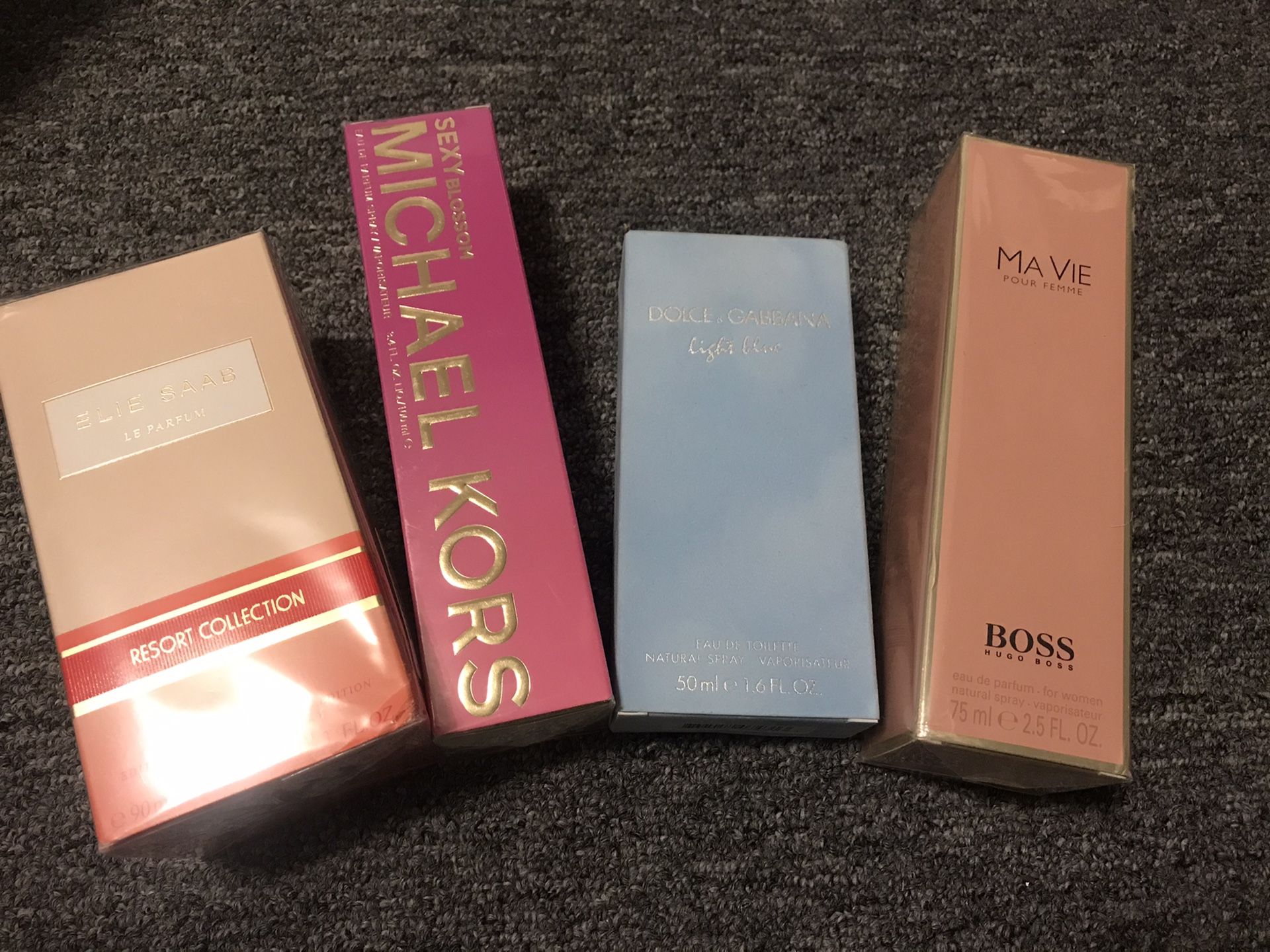 New woman’s perfume $50 each