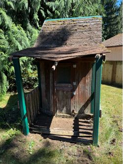 Falling down 25 yr old Costco wooden playhouse - FREE!
