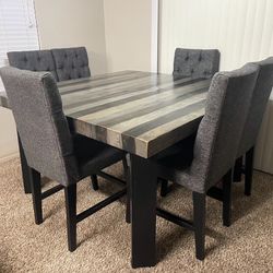 Wooden table with chairs
