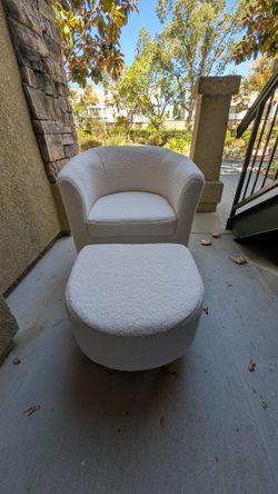 White barrel chair and ottoman