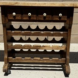 Ethan Allen oak rolling island with wooden chop block top, wine rack below (wine not included). 14" deep × 30" high x 54" extensions up. 32" with side