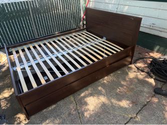 Queen size bed frame with drawers drop off $10 extra we sell all the time