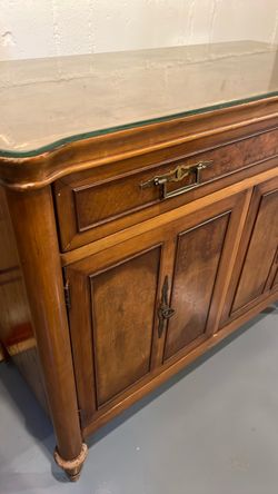 all wood cabinet with glass top