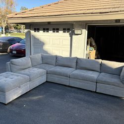 Excellent like new six piece modular Thomasville sectional grey