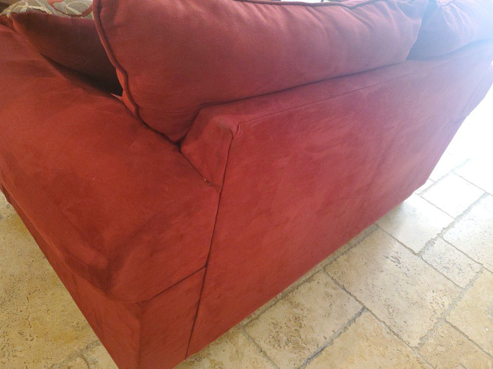 Red couch love seat