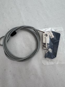 This item appears to be a Noble Locks TZ54 Universal Compact Wedge Lock Kit, commonly used to secure laptops and https://offerup.com/redirect/?o=dGFib