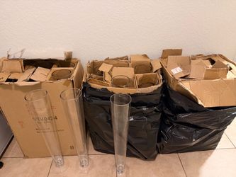 21- 2’ft Center vases with 4 inch openings .