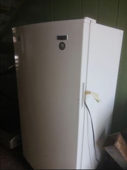 White Maytag freezer vertical