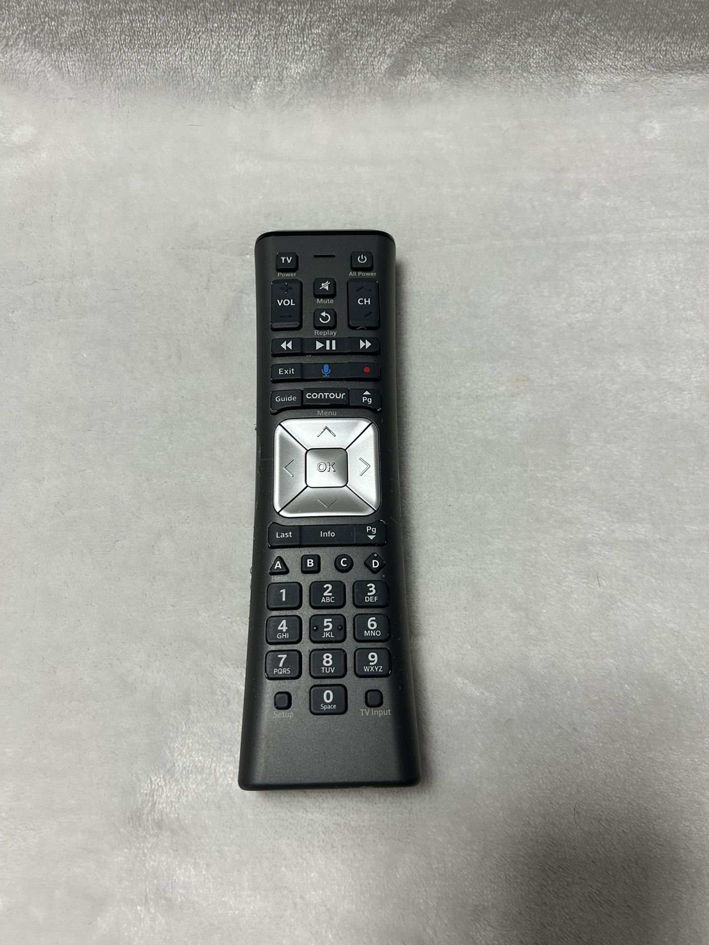 A Black Xfinity XR11 Voice Activated Remote Control
