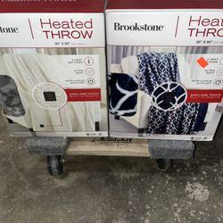 brookstone heated throw $25 each 