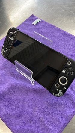 Nintendo Switch with Black Floral Joy-Con Case
