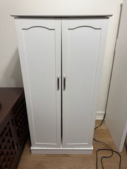 White wood pantry with shelves