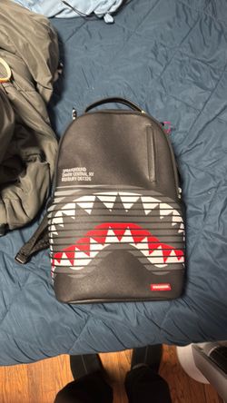 Spray ground backpack