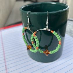 Green and orange beaded hoop earrings