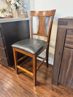 Brown wood / Black leather chair