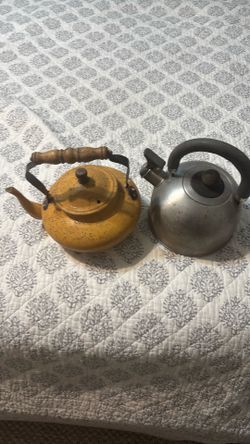Two cute little coffee pots