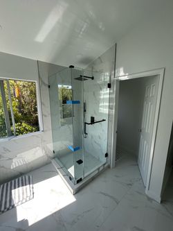 Frameless Glass Shower Enclosure with Matte Black Hardware