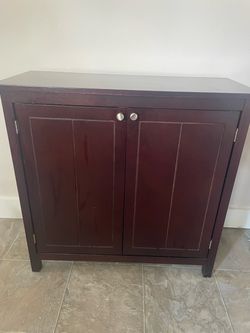 Dark wood storage cabinet