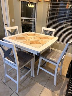 Counter height table with four chairs Counter height table with four chairs