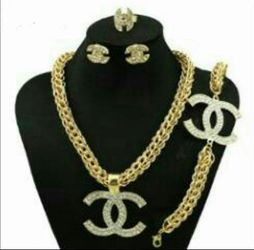 Chanel gold jewelry set with diamonds. 1Necklace, 2earrings