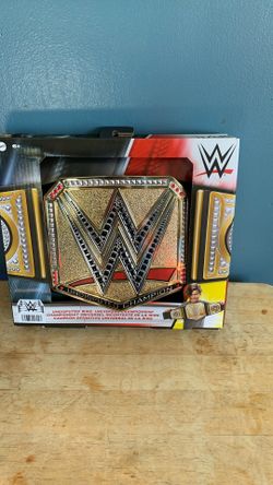 WWE UNDISPUTED WWE UNIVERSAL CHAMPIONSHIP KIDS BELT $20 EACH 2 AVAILABLE 