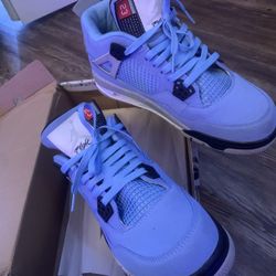 University Blue Jordan 4