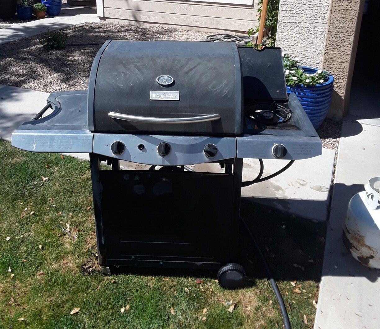 BBQ Grill and Propane Tanks