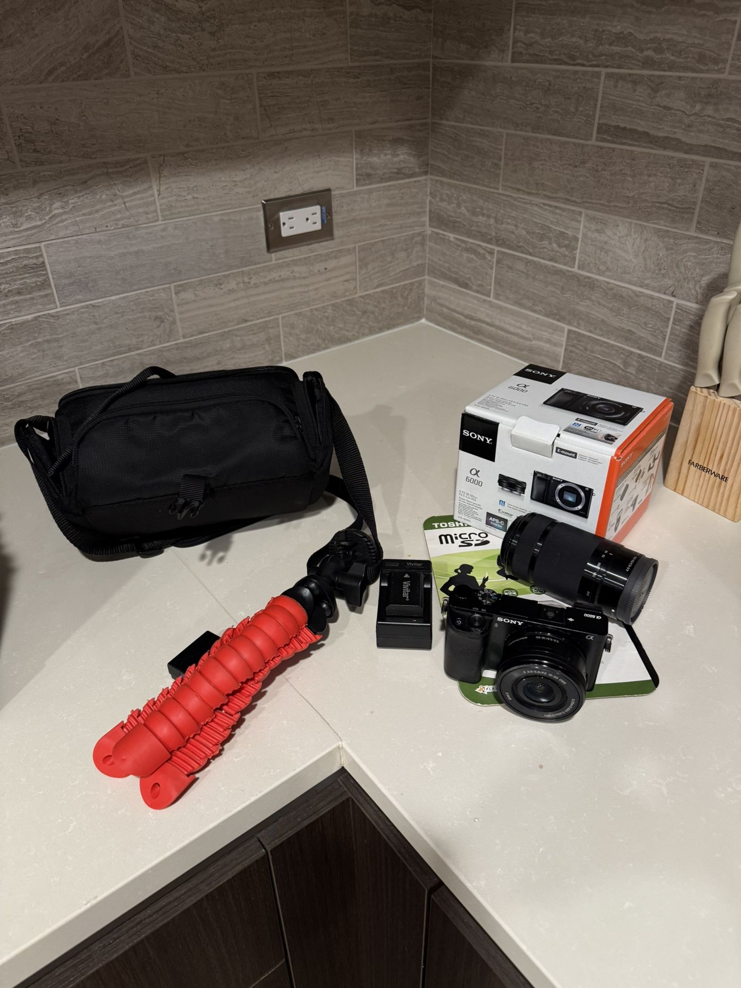 Sony Alpha a6000 + 16-50 mm + 55-210 mm Lens Kit – 2 Batteries, Bag & Tripod Bundle
