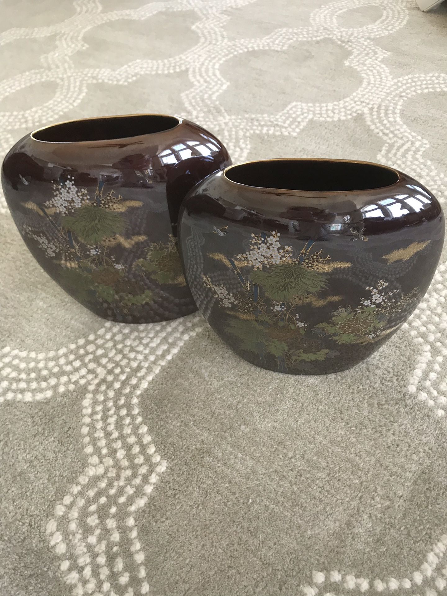 Pair of Japanese flat oval vases with bamboo and flower designs