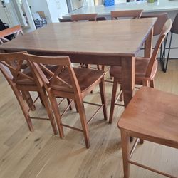 Solid Wood Table And 7 Chairs 