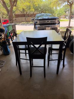 Bar height dining table