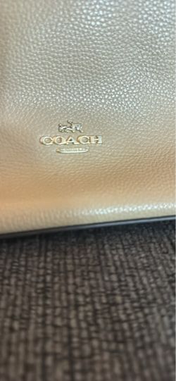 Tan coach purse