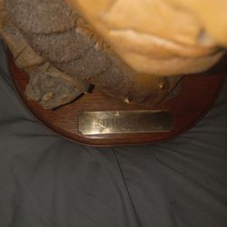 Antique sculpture sitting Bull