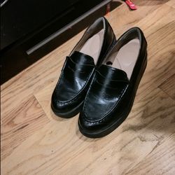Black leather loafers with a chunky sole