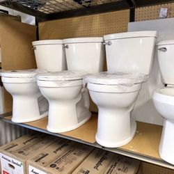 American Standard Champion Two-Piece 1.28 GPF Single Flush Elongated Chair Height Toilet with Slow-Close Seat in White