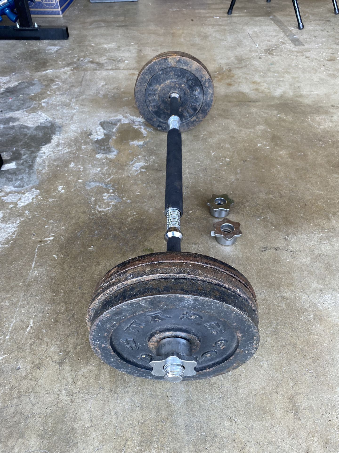60 Lbs of Standard Weights and Curl Bar