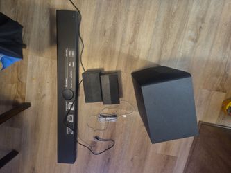 LG sound bar with sub woofer and 2 surround sound speakers. I didnt include in pic but will supply hdmi cord as well