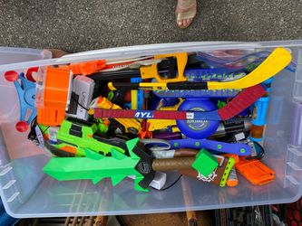 A huge collection of quirt guns ,swords, and other fun toys