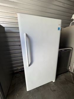 Up right Frigidaire Freezer