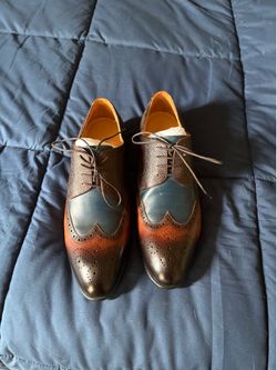 Wing tip dress shoes - worn for less than five hours.