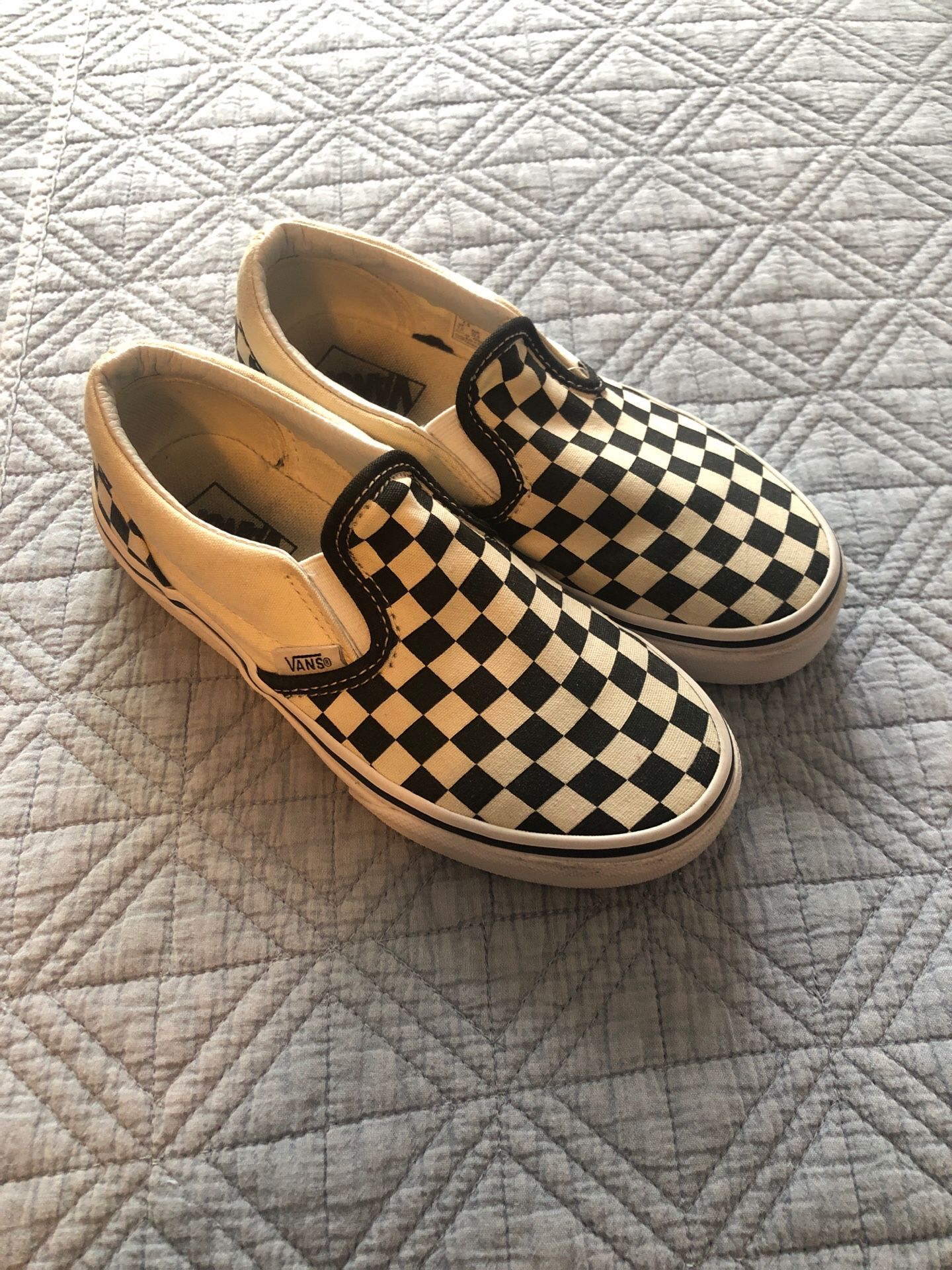 Vans size 1.5 my son only wore them twice. They’re in great condition.