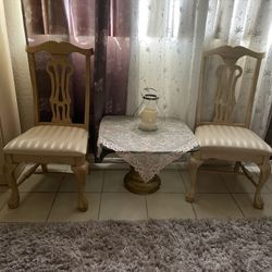 Two Chairs And Glass Table