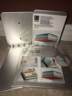 Conseal invisible book shelf